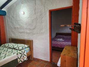 Postel nebo postele na pokoji v ubytování Hotel Dulce Campestre