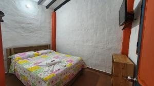 Postel nebo postele na pokoji v ubytování Hotel Dulce Campestre