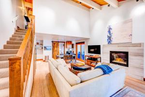 a living room with a couch and a fireplace at Juanita by the Bay in Incline Village