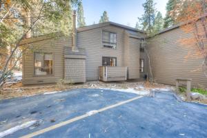 a house with a parking lot in front of it at Juanita by the Bay in Incline Village