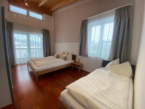 Postel nebo postele na pokoji v ubytování Chalet Elisabeth