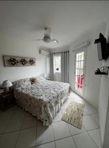 Voodi või voodid majutusasutuse Casa Sonia&Rei em condo fechado, vista para o jardim toas