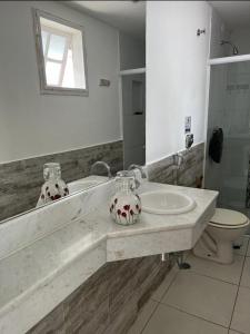 Vannituba majutusasutuses Casa Sonia&Rei em condo fechado, vista para o jardim