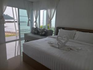 Postel nebo postele na pokoji v ubytování White house bailan resort