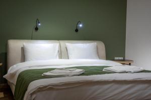 Voodi või voodid majutusasutuse Hotel 1700 toas