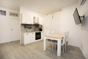 Kuchyň nebo kuchyňský kout v ubytování Apartament al cor de Begur