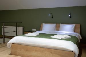 Voodi või voodid majutusasutuse Hotel 1700 toas