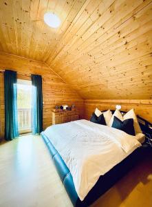 Posteľ alebo postele v izbe v ubytovaní Blockhaus Semmering
