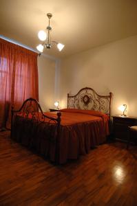 Ένα ή περισσότερα κρεβάτια σε δωμάτιο στο La Margherita