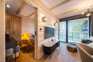 Posezení v ubytování Apartament Dream&Snow + 61 fotografií