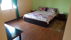 Voodi või voodid majutusasutuse Sevan Garden Complex toas