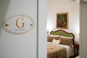 Postel nebo postele na pokoji v ubytování B&B CORSO VITTORIO