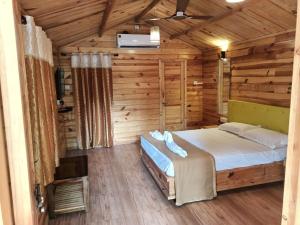 Katil atau katil-katil dalam bilik di Sindhu Swagat Homestay