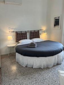 Postel nebo postele na pokoji v ubytování B&B Cristina e Stefano