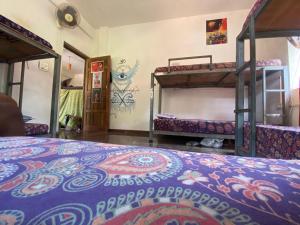 Postel nebo postele na pokoji v ubytování NamahStay Hostel, Cowork & Artist residency Arambol