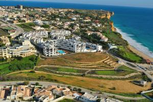 an aerial view of a resort next to the ocean at Belmar Spa & Beach Resort in Lagos