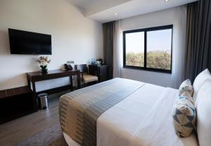 Sarova Imperial Hotel客房内的一张或多张床位