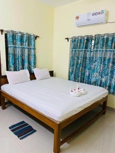 Giường trong phòng chung tại KHOLA HAWA GUEST HOUSE