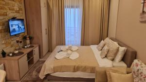 Postel nebo postele na pokoji v ubytování Magic Kop - Milmari Resort