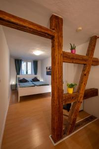 a bedroom with a bunk bed in a room at Ferienwohnung Ulla in Bad Staffelstein