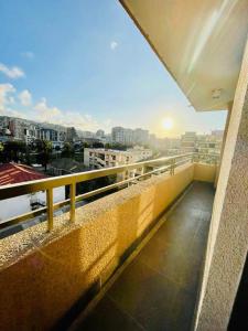 a balcony of a building with a view of a city at Depto en Viña in Viña del Mar