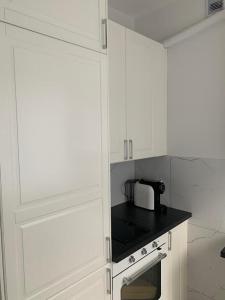 Kuchnia lub aneks kuchenny w obiekcie Jurata Apartament Glamour