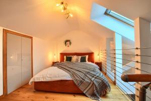 Posteľ alebo postele v izbe v ubytovaní Apartament Pistacjowy
