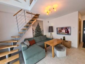 Posedenie v ubytovaní Apartament Pistacjowy