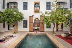 Bazén v ubytování Riad les remparts de la kasbah nebo v jeho okolí