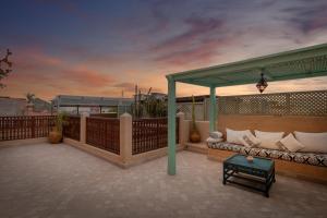 Balkón nebo terasa v ubytování Riad les remparts de la kasbah