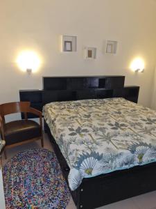 Ένα ή περισσότερα κρεβάτια σε δωμάτιο στο Superbe appartement 2 chambres avec balcon à MIXTA