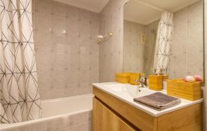 a bathroom with a sink and a tub and a shower at Nice Apartment In Torrevieja With Wifi in Torrevieja +8 photos