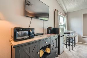 a microwave sitting on top of a counter in a room at A Colorado Room With a View - King in Colorado Springs