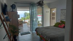 Fotografie z fotogalerie ubytování Studio Vaimiti pour 2 personnes vue mer et Moorea v destinaci Faaa