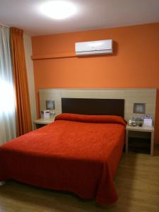 Postel nebo postele na pokoji v ubytování Hotel GBC Avenida Pontevedra