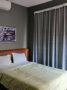 Ένα ή περισσότερα κρεβάτια σε δωμάτιο στο Villa Oasis Cancun Airport