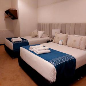 Cama ou camas em um quarto em Katari at Plaza de Armas Cusco