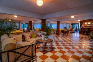 Posezení v ubytování Hotel Rancho Constanza & Cabañas de la Montaña