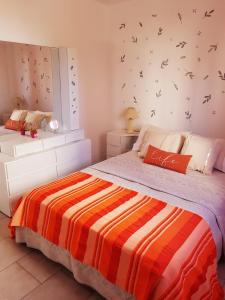 Una cama o camas en una habitación de Welcome MDP Solo familias