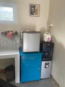 Køkken eller tekøkken på Rumah Paron Homestay Barat + 7 billeder