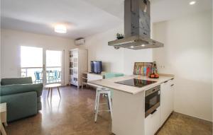 Kuchyň nebo kuchyňský kout v ubytování Lovely Apartment In Altea