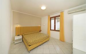 Ένα ή περισσότερα κρεβάτια σε δωμάτιο στο Bilocale