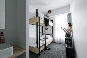 Katil atau katil-katil dalam bilik di Imu Hotel Kyoto