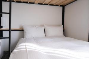 Katil atau katil-katil dalam bilik di Imu Hotel Kyoto