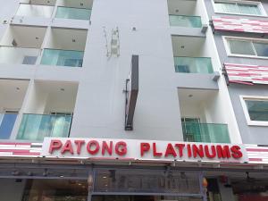a building with a sign that reads patio bathrooms at Patong Platinums Phuket in Patong Beach