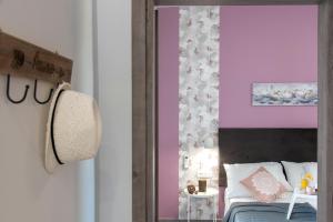 A bed or beds in a room at Chania Design Suites