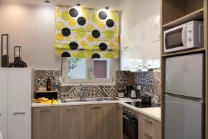 A kitchen or kitchenette at Chania Design Suites