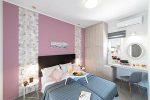 A television and/or entertainment centre at Chania Design Suites