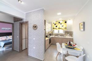 A kitchen or kitchenette at Chania Design Suites