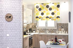 A kitchen or kitchenette at Chania Design Suites